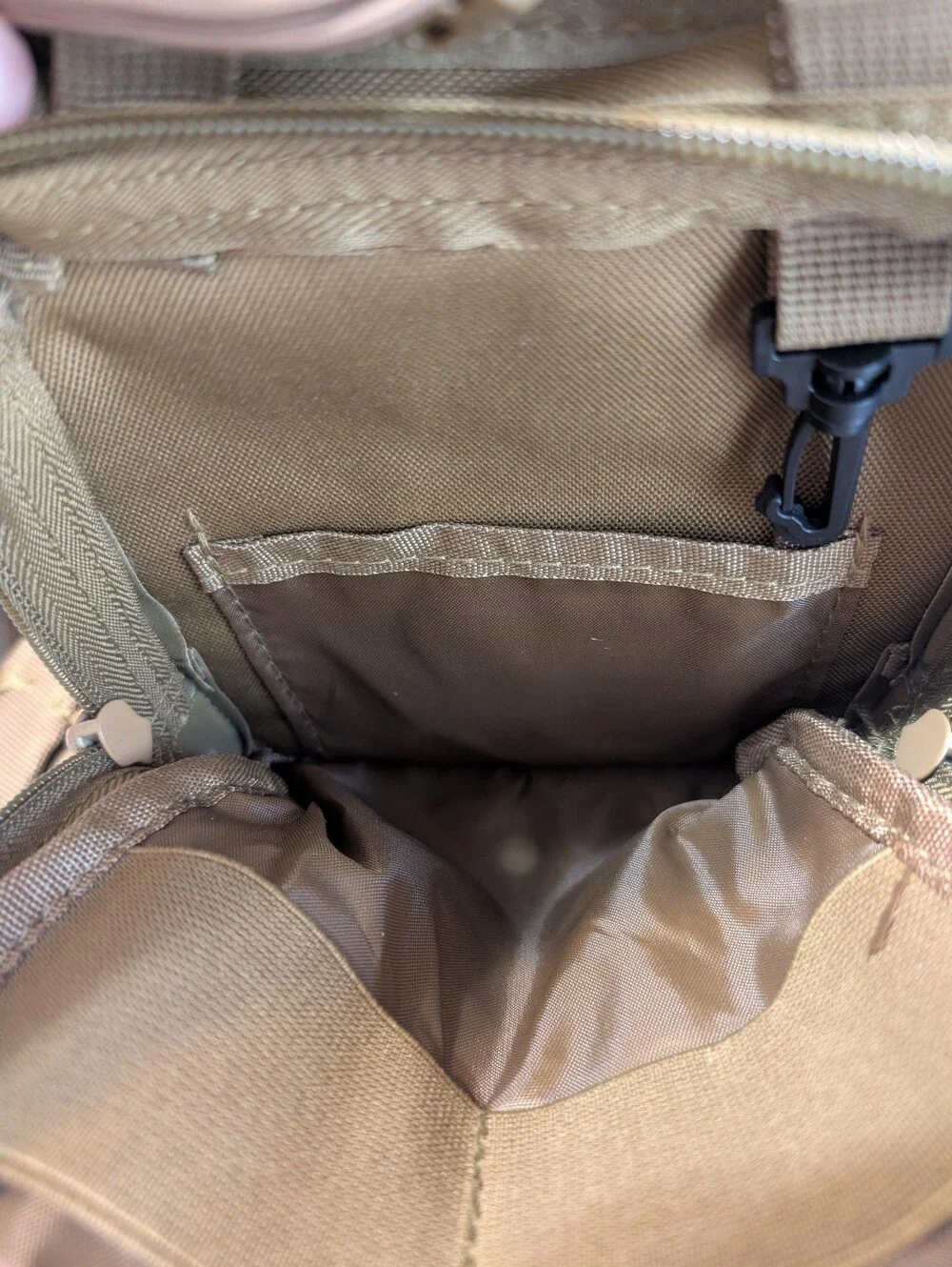New tan tactical sling pack with holster
